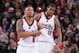 PORTLAND, OR - MARCH 5: Damian Lillard #0 and LaMarcus Aldridge #12 of the Portland Trail Blazers stand on the court against the Atlanta Hawks on March 5, 2014 at the Moda Center Arena in Portland, Oregon. NOTE TO USER: User expressly acknowledges and ag