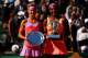 PARIS, FRANCE - JUNE 06: Runner up Lucie Safarova of Czech Republic and winner Serena Williams of the United States pose with their trophys after the Women's Singles Final on day fourteen of the 2015 French Open at Roland Garros on June 6, 2015 in Paris
