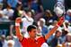 PARIS, FRANCE - JUNE 03: Novak Djokovic of Serbia celebrates victory in his Men's quarter final match against Rafael Nadal of Spain on day eleven of the 2015 French Open at Roland Garros on June 3, 2015 in Paris, France. (Photo by Julian Finney/Getty Im