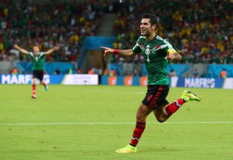 RECIFE, BRAZIL - JUNE 23:  Rafael Marquez of Mexico celebrates scoring  his team's first goal during the 2014 FIFA World Cup Brazil Group A match between Croatia and Mexico at Arena Pernambuco on June 23, 2014 in Recife, Brazil.  (Photo by Robert Cianflon