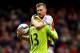 LONDON, ENGLAND - APRIL 04: Per Mertesacker of Arsenal celebrates with David Ospina of Arsenal after the Barclays Premier League match between Arsenal and Liverpool at Emirates Stadium on April 4, 2015 in London, England. (Photo by Julian Finney/Getty Im