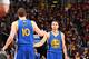 CLEVELAND, OH - JUNE 11: Teammates David Lee #10 of the Golden State Warriors and Stephen Curry #30 of the Golden State Warriors high-five during Game Four of the 2015 NBA Finals at The Quicken Loans Arena on June 11, 2015 in Cleveland, Ohio. NOTE TO USE