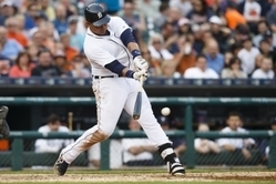Jun 9, 2015; Detroit, MI, USA; Detroit Tigers first baseman Miguel Cabrera (24) hits a single in the fourth inning against the Chicago Cubs at Comerica Park. Mandatory Credit: Rick Osentoski-USA TODAY Sports