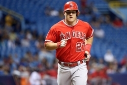 Jun 11, 2015; St. Petersburg, FL, USA; Los Angeles Angels center fielder Mike Trout (27) runs home after hitting a home run during the sixth inning against the Tampa Bay Rays at Tropicana Field. Mandatory Credit: Kim Klement-USA TODAY Sports