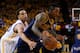 OAKLAND, CA - JUNE 14: J.R. Smith #5 of the Cleveland Cavaliers drives against Stephen Curry #30 of the Golden State Warriors in the third quarter during Game Five of the 2015 NBA Finals at ORACLE Arena on June 14, 2015 in Oakland, California. NOTE TO US
