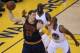June 14, 2015; Oakland, CA, USA; Cleveland Cavaliers center Timofey Mozgov (20) controls the all against the defense of Golden State Warriors guard Andre Iguodala (9) and forward Draymond Green (23) in the first half in game five of the NBA Finals. at Ora