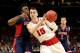 LOS ANGELES, CA - MARCH 28: Sam Dekker #15 of the Wisconsin Badgers goes up for a shot against Stanley Johnson #5 of the Arizona Wildcats in the first half during the West Regional Final of the 2015 NCAA Men's Basketball Tournament at Staples Center on M
