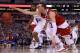 INDIANAPOLIS, IN - APRIL 06: Sam Dekker #15 of the Wisconsin Badgers goes for a loose ball against Matt Jones #13 of the Duke Blue Devils in the second half during the NCAA Men's Final Four National Championship at Lucas Oil Stadium on April 6, 2015 in In