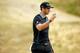 UNIVERSITY PLACE, WA - JUNE 18: Dustin Johnson of the United States waves to the gallery on the 18th green during the first round of the 115th U.S. Open Championship at Chambers Bay on June 18, 2015 in University Place, Washington. (Photo by Ezra Shaw/G