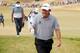 UNIVERSITY PLACE, WA - JUNE 18: Phil Mickelson of the United States gives a thumbs-up as he leaves the 11th green during the first round of the 115th U.S. Open Championship at Chambers Bay on June 18, 2015 in University Place, Washington. (Photo by Andr
