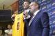 Aug 26, 2014; Independence, OH, USA; Cleveland Cavaliers player Kevin Love (left) and general manager David Griffin pose for photographers at Cleveland Clinic Courts. Mandatory Credit: David Richard-USA TODAY Sports