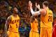 CLEVELAND,OH - MAY 26: J.R. Smith #5 , Timofey Mozgov #20 , Iman Shumpert #4 of the Cleveland Cavaliers shake hands after a play against the Atlanta Hawks at the Quicken Loans Arena During Game Four of the Eastern Conference Finals during the 2015 NBA P