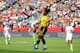 EDMONTON, AB - JUNE 22: Abby Wambach #20 of the United States heads the ball against Orianica Velasquez #9 of Colombia in the first half in the FIFA Women's World Cup 2015 Round of 16 match at Commonwealth Stadium on June 22, 2015 in Edmonton, Canada. (