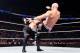 Kevin Owens hits the pop-up powerbomb.