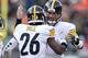 CINCINNATI, OH - DECEMBER 7: Ben Roethlisberger #7 of the Pittsburgh Steelers congratulates Le'Veon Bell #26 of the Pittsburgh Steelers after scoring a touchdown during the fourth quarter of the game against the Cincinnati Bengals at Paul Brown Stadium o