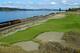 Chance to view along the 16th and 17th holes was lost because of the drop down to the track level. A boardwalk would have allowed actual views of the golf course, not just the fescue. Mounds on the other side obscured play.