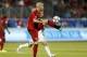 Jun 24, 2015; Toronto, Ontario, CAN; Toronto FC midfielder Michael Bradley (4) goes to kick the ball against the Montreal Impact at BMO Field. Toronto defeated Montreal 3-1. Mandatory Credit: John E. Sokolowski-USA TODAY Sports