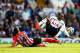 LONDON, ENGLAND - OCTOBER 05: Morgan Schneiderlin of Southampton challenges Danny Rose of Spurs during the Barclays Premier League match between Tottenham Hotspur and Southampton at White Hart Lane on October 5, 2014 in London, England. (Photo by Ian Wa