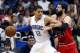 Apr 8, 2015; Orlando, FL, USA; Orlando Magic forward Tobias Harris (12) pushes back against Chicago Bulls forward Nikola Mirotic (44) during the second half at Amway Center. The Magic won 105-103. Mandatory Credit: Reinhold Matay-USA TODAY Sports
