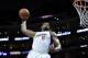 LOS ANGELES, CA - APRIL 13: DeAndre Jordan #6 of the Los Angeles Clippers attempts an alley-oop dunk between J.J. Hickson #7 and Gary Harris #14 of the Denver Nuggets during a 110-103 Clipper win at Staples Center on April 13, 2015 in Los Angeles, Califo