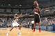 MEMPHIS, TN - APRIL 22: LaMarcus Aldridge #12 of the Portland Trail Blazers shoots against Zach Randolph #50 of the Memphis Grizzlies in Game Two of the Western Conference Quarterfinals during the 2015 NBA Playoffs on April 22, 2015 at FedExForum in Memp