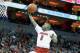 LOUISVILLE, KY - FEBRUARY 21: Terry Rozier #0 of the Louisville Cardinals shoots the ball during the game against the Miami Hurricanes at KFC YUM! Center on February 21, 2015 in Louisville, Kentucky. (Photo by Andy Lyons/Getty Images)