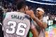 BOSTON, MA - MARCH 4: Marcus Smart #36 and Isaiah Thomas #4 of the Boston Celtics celebrates after winning in the final second of the game against the Utah Jazz on March 4, 2015 at TD Garden in Boston, Massachusetts. NOTE TO USER: User expressly acknowl