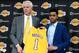 Jun 29, 2015; Los Angeles, CA, USA; Los Angeles Lakers guard D'Angelo Russell (1) is introduced to the media by general manager Mitch Kupchak during a press conference at the Toyota Sports Center. Mandatory Credit: Jayne Kamin-Oncea-USA TODAY Sports