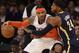 Carmelo Anthony was courted by the Rockets and Bulls last summer but chose to remain with the rebuilding Knicks.