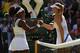 LONDON, ENGLAND - JULY 09: Serena Williams of the United States celebrates at the net after winning the Ladies Singles Semi Final match against Maria Sharapova of Russia during day ten of the Wimbledon Lawn Tennis Championships at the All England Lawn Te