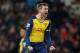 STOKE ON TRENT, ENGLAND - DECEMBER 06: Per Mertesacker of Arsenal reacts after his team's second goal during the Barclays Premier League match between Stoke City and Arsenal at the Britannia Stadium on December 6, 2014 in Stoke on Trent, England. (Phot
