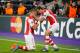 BRUSSELS, BELGIUM - OCTOBER 22: Kieran Gibbs of Arsenal (L) celebrates with team mate Nacho Monreal as he scores their first and equalising goal during the UEFA Champions League Group D match between RSC Anderlecht and Arsenal at Constant Vanden Stock St