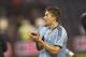May 20, 2015; Kansas City, KS, USA; Sporting Kansas City defender Matt Besler (5) shows his appreciation to the Kansas City fans after a 4-2 win over the New England Revolution at Sporting Park. Mandatory Credit: Gary Rohman/MLS/USA TODAY Sports
