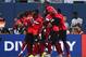 Jul 9, 2015; Chicago, IL, USA; The Trinidad & Tobago players celebrate after a goal in the first half during CONCACAF Gold Cup group play at Soldier Field. Mandatory Credit: Mike DiNovo-USA TODAY Sports