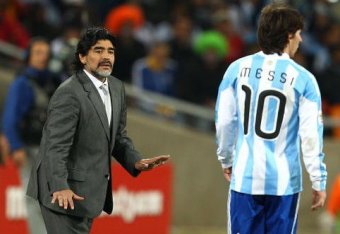 JOHANNESBURG, SOUTH AFRICA - JUNE 27:  Diego Maradona head coach of Argentina gestures to Lionel Messi of Argentina during the 2010 FIFA World Cup South Africa Round of Sixteen match between Argentina and Mexico at Soccer City Stadium on June 27, 2010 in 