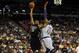 Jul 10, 2015; Las Vegas, NV, USA; Minnesota Timberwolves forward Karl-Anthony Towns (32) shoots against the defense of Los Angeles Lakers center Robert Upshaw (12) during an NBA Summer League game at Thomas & Mack Center. Minnesota won the game 81-68. Man