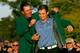 AUGUSTA, GA - APRIL 08: Phil Mickelson presents Zach Johnson with the Masters green jacket after Johnson's two-stroke victory at The Masters at the Augusta National Golf Club on April 8, 2007 in Augusta, Georgia. (Photo by Harry How/Getty Images)