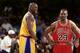 INGLEWOOD, CA - FEBRUARY 1: Shaquille O'Neal #34 of the Los Angeles Lakers jokes with Michael Jordan #23 of the Chicago Bulls on February 1, 1998 at The Forum in Inglewood, California. NOTE TO USER: User expressly acknowledges and agrees that, by download