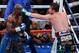 Alvarez lands a shot on Mayweather in 2013.