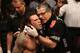 ABU DHABI, UNITED ARAB EMIRATES - APRIL 11: (L-R) Clay Guida is inspected by Jacob 'Stitch' Duran before Guida faces Tatsuya Kawajiri of Japan during UFC Fight Night 39 at du Arena on April 11, 2014 in Abu Dhabi, United Arab Emirates. (Photo by Warren L