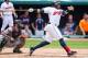 CLEVELAND, OH - JUNE 24: Carlos Santana #41 of the Cleveland Indians hits a two RBI double during the third inning against the Detroit Tigers at Progressive Field on June 24, 2015 in Cleveland, Ohio. (Photo by Jason Miller/Getty Images)