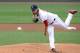 Jul 7, 2015; Boston, MA, USA; Boston Red Sox starting pitcher Wade Miley (20) pitches during the first inning against the Miami Marlins at Fenway Park. Mandatory Credit: Bob DeChiara-USA TODAY Sports