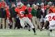COLUMBUS, OH - NOVEMBER 23: Quarterback Braxton Miller #5 of the Ohio State Buckeyes runs with the ball against the Indiana Hoosiers at Ohio Stadium on November 23, 2013 in Columbus, Ohio. (Photo by Jamie Sabau/Getty Images)