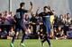 BURGO DE OSMA, SPAIN - JULY 25: Angel Correa (R) of Club Atletico de Madrid celebrates with Jesus Gamez after scoring his team's 2nd goal during the Jesus Gil y Gil Memorial pre-season friendly match between Numancia and Club Atletico de Madrid at the C