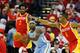 HOUSTON, TX - MARCH 19: Ty Lawson #3 of the Denver Nuggets looks to pass between Patrick Beverley and Terrence Jones #6 of the Houston Rockets during their game at the Toyota Center on March 19, 2015 in Houston, Texas. NOTE TO USER: User expressly ackno