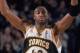 11 Jan 2002: Forward Vin Baker #42 of the Seattle SuperSonics celebrates during the NBA game against the Cleveland Cavaliers at Key Arena in Seattle, Washington. The SuperSonics edged the Cavaliers 102-100. NOTE TO USER: User expressly acknowledges and