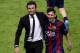 Barcelona's coach Luis Enrique and Barcelona's Argentinian forward Lionel Messi (R) celebrate after winning the UEFA Champions League Final football match between Juventus and FC Barcelona at the Olympic Stadium in Berlin on June 6, 2015. AFP P