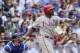 Jul 26, 2015; Chicago, IL, USA; Philadelphia Phillies first baseman Ryan Howard (6) hits a two run homer in the eighth inning against the Chicago Cubs at Wrigley Field. Mandatory Credit: Matt Marton-USA TODAY Sports