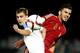 Russia's Denis Yakuba (L) vies for the ball with Spain's Dani Ceballos (R) during the UEFA 2015 European U-19 Championship final football match between Russia and Spain at the Municipal Stadium in Katerini, Greece, on July 19, 2015. AFP PHOTO / STRINGER