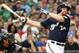 Jun 28, 2015; Milwaukee, WI, USA; Milwaukee Brewers first baseman Adam Lind (24) hits a 2-run homer in the eighth inning against the Minnesota Twins at Miller Park. The Brewers beat the Twins 5-3. Mandatory Credit: Benny Sieu-USA TODAY Sports